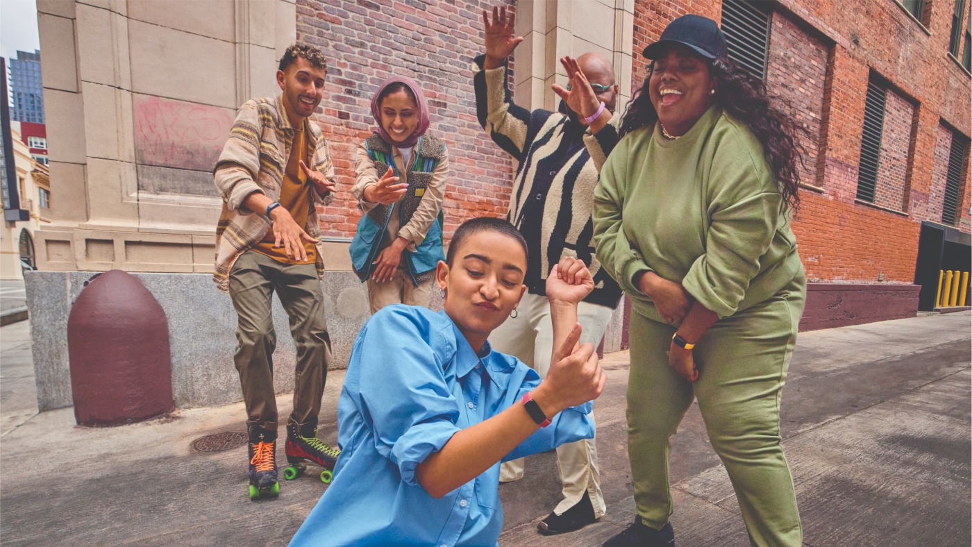 Fitbit people dancing in the street