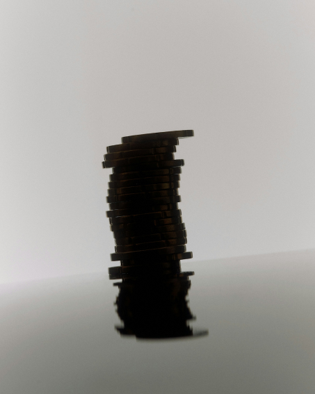 Black and white image of a stack of coins